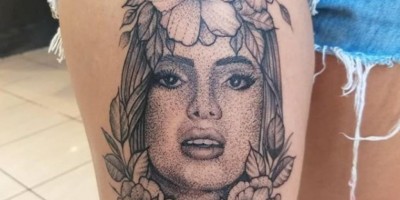 Fã tatua rosto de Anitta na coxa e ganha elogio da cantora 