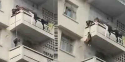 Avô pendura neto em sacada de prédio para salvar gato; veja o vídeo