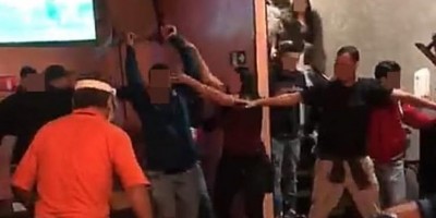 Clientes de bar espancam homem que agrediu ex-mulher que bebia com prima