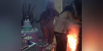 Vestido de grávida pega fogo durante chá revelação em GO; Veja o vídeo