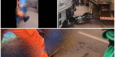 Motociclista fica gravemente ferido após cair embaixo de caminhão e quase ser...